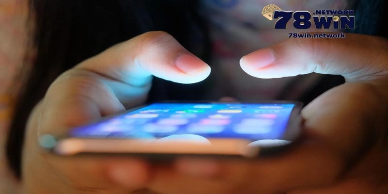 a person using a cell phone